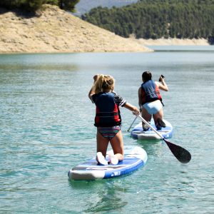 paddle surf y limpieza de rios, actividades de aventura en jornadas medioambientales